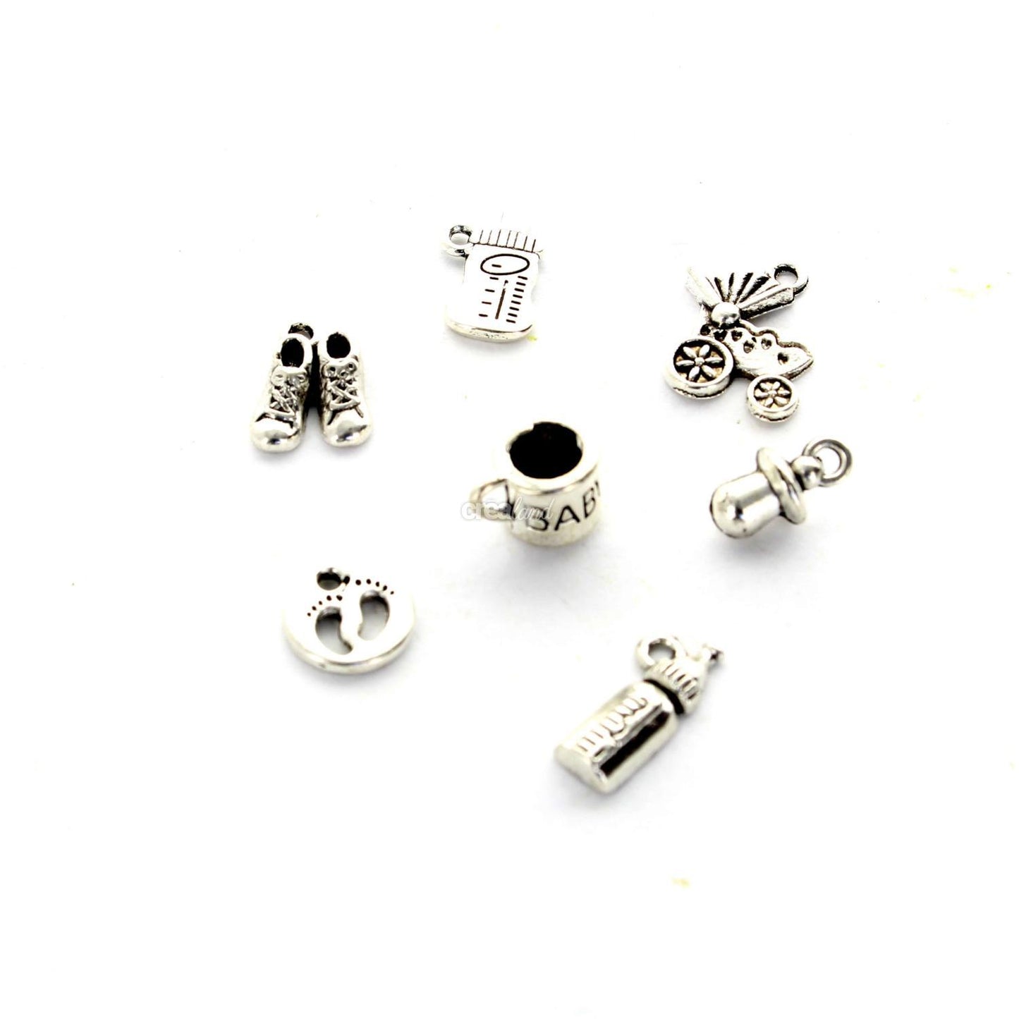 Breloques chromée s N°36 vendues par 7 assorties